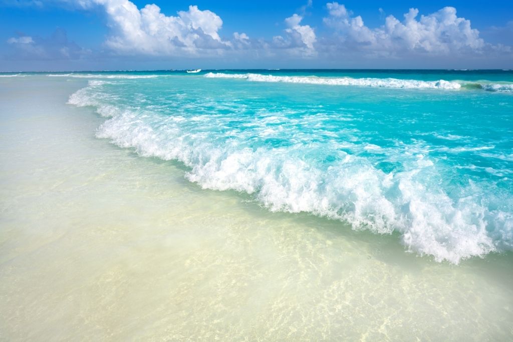 The warm turquoise water is Tulum's more alluring feature drawing tourists.